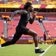 Marquise Brown #5 of the Baltimore Ravens warms up before the preseason game against the Washington Football Team at FedExField on August 28, 2021 in Landover, Maryland. Brown, now with the Arizona Cardinals, was arrested for “criminal speeding” in Arizona yesterday.